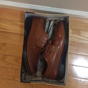 Brown boys' dress shoe.